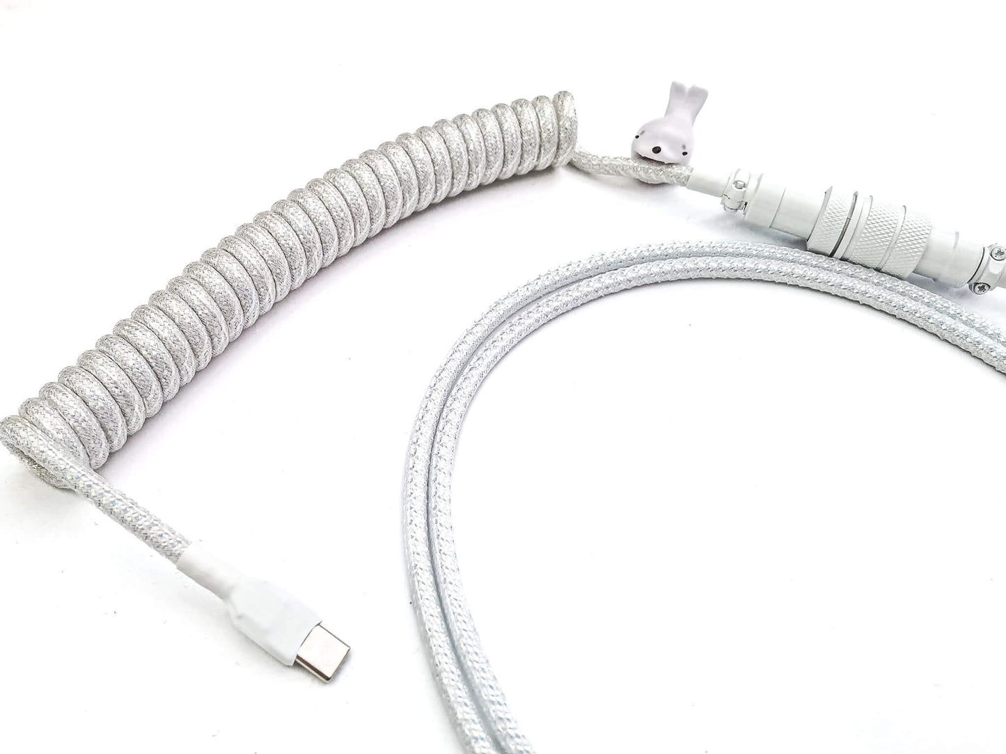 shiny white coiled cable