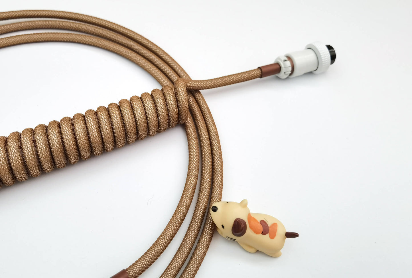 Brown coiled keyboard cable
