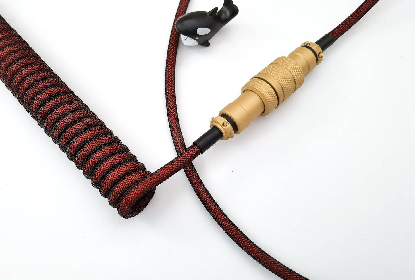 Dark red coiled cable 