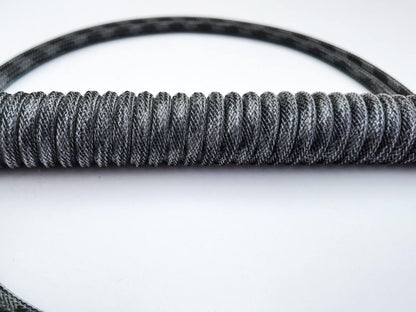 Grey black coiled keyboard cable