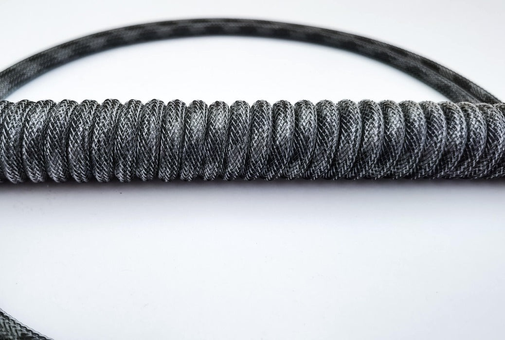 Grey black coiled keyboard cable