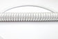 white shiny coiled cable